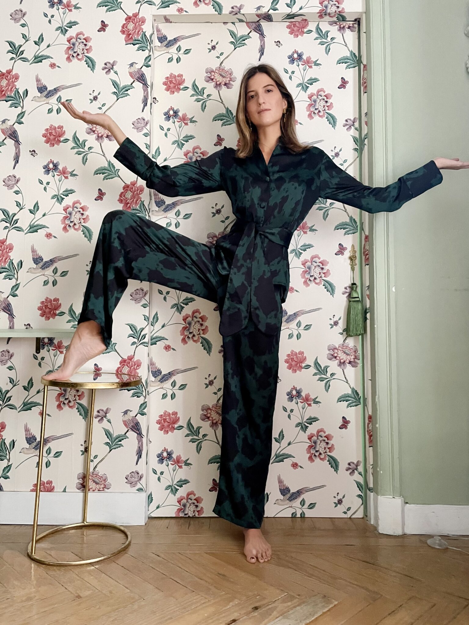 Ynes Ibarra wearing silk luxury loungewear pyjama in navy and peacock tones