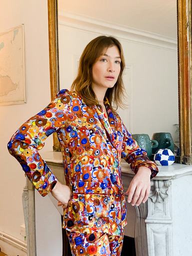 Artist Sofia de Moser Leitao wearing Diana d'Orville silk suit - multicolor circular prints