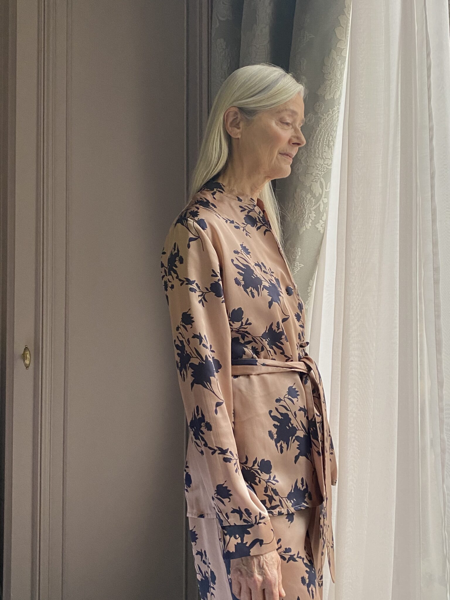 Axelle Doue in Diana d'Orville luxury silk suit roses prints