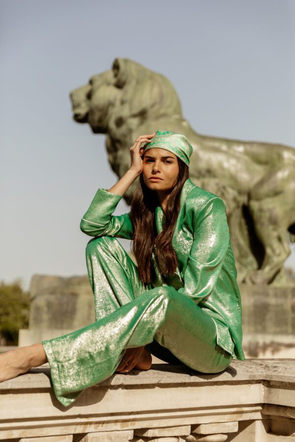Clara Muniz in Diana d'Orville luxury lamé turquoise suit