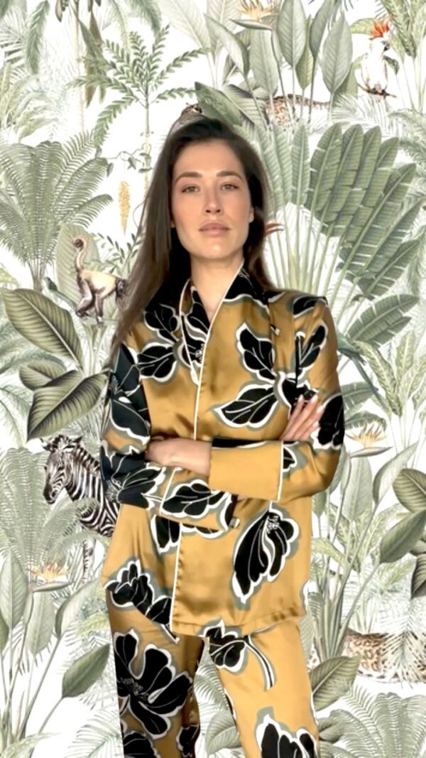 Audrey Tasiaux in Diana d'Orville luxury suit in gold and flower prints