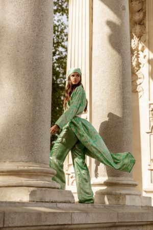 Clara Muniz in Diana d'Orville luxury silk turquoise gown